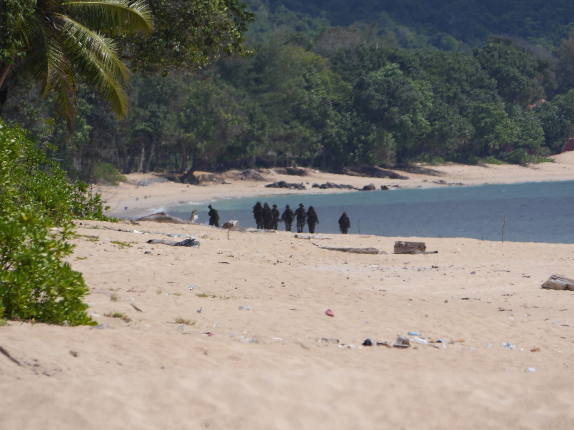 Photo by Author — mysterious figures in black — Desaru Beach, Kota Tinggi, Johor, Malaysia