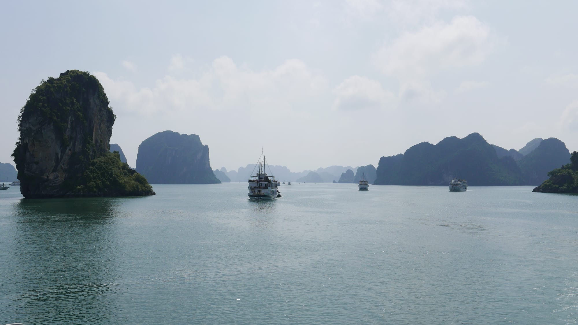 Photo by Author — boats in Ha Long Bay, Vietnam